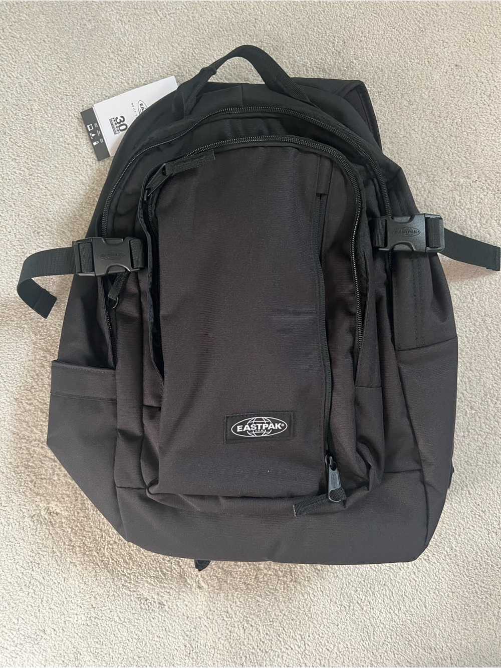 Eastpak Black Men's Backpack with Front Pocket and Side Straps
